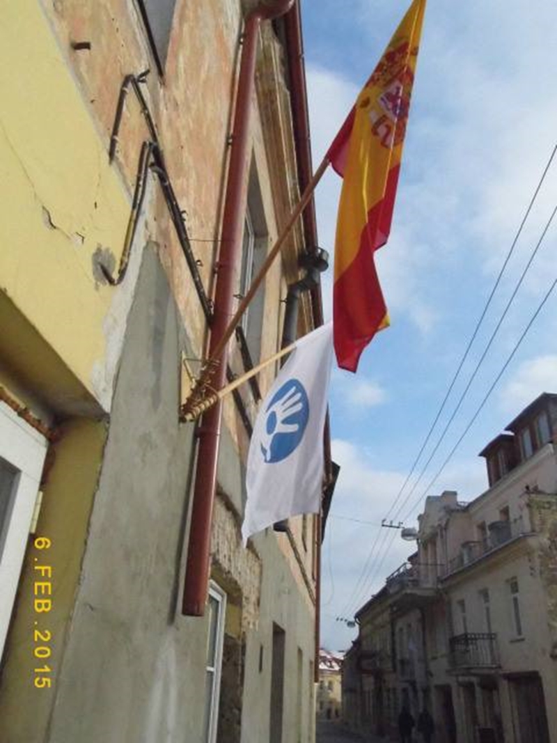 Uzhupis and Spanish flags on the day of unveiling the Spanish translation of Constitution